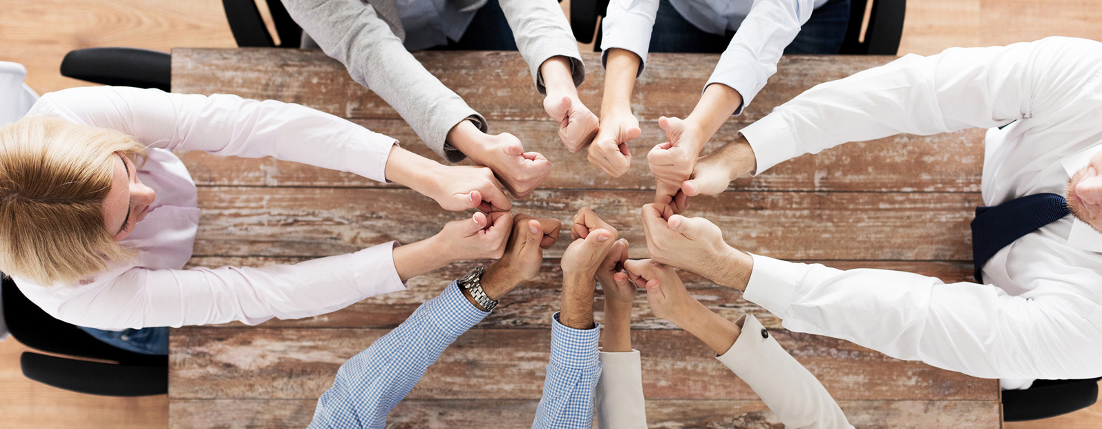 business team showing thumbs up